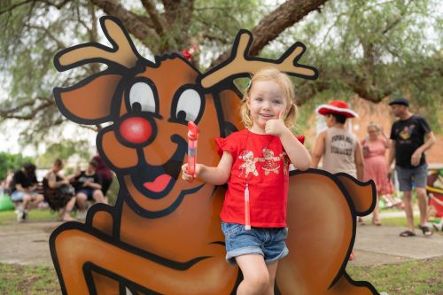 A picture of a girl with a reindeer mural