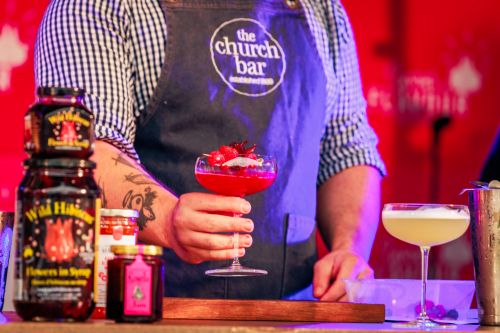 Picture of a man serving a cocktail