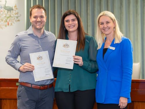 Picture of Ryan and Christinique Chapman with Deputy Mayor Sarah McMahon at their Australian citizenship ceremony in October.