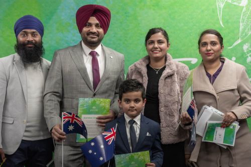 A picture of a family at July's Citizenship Ceremony